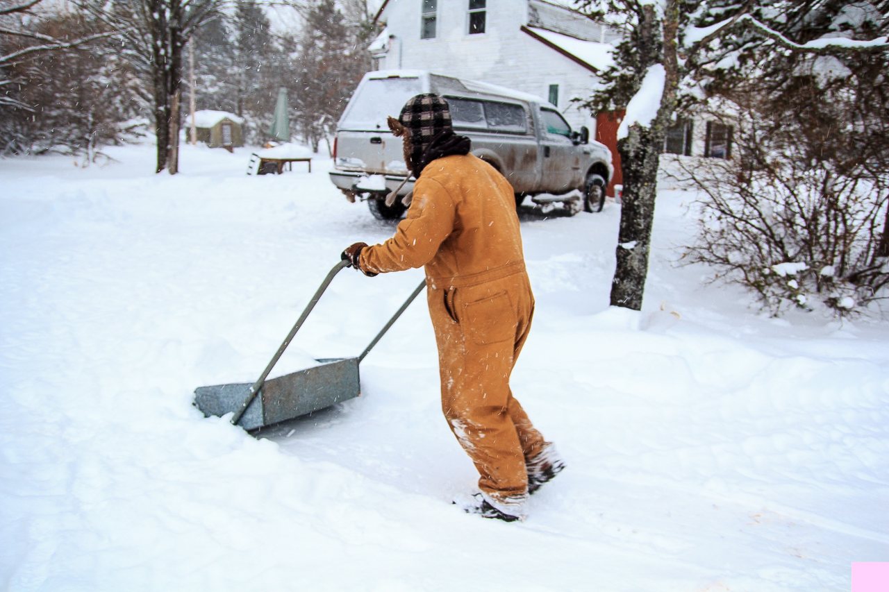 Caveman demonstrating the use of the "Yooper Scooper"